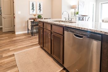 Kitchen bar with a sink and a dishwasher 